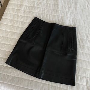 Faux leather high-waisted mini skirt